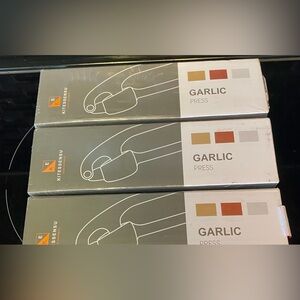 Kitchen Kitessensu Garlic Press - Brown & White Packaging